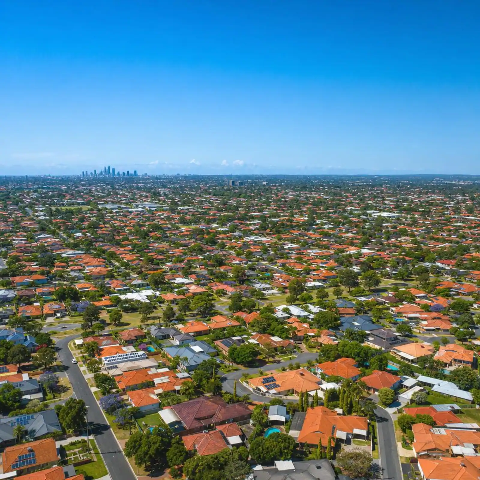 Aerial view of residential streets and rooftops in Perth